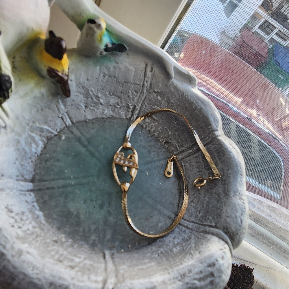 Avon Gold-Tone Bracelet with Elegant Design